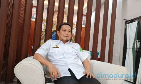 Foto: Kepala Disnaker Sumenep, Mustangin, (Ari/Doc. Dimadura).